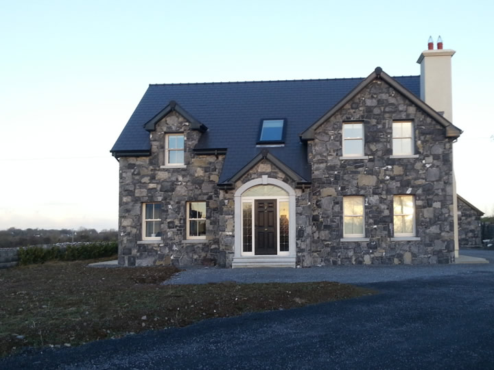 Stone.House.With.Door.Archway.Cladding