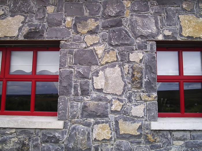 Limestone.Cladding.House.Red.Windows6.700.by.525